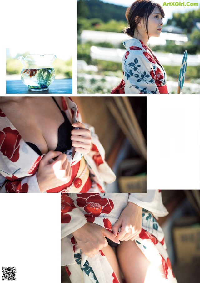 A woman in a kimono is holding a fish bowl.
